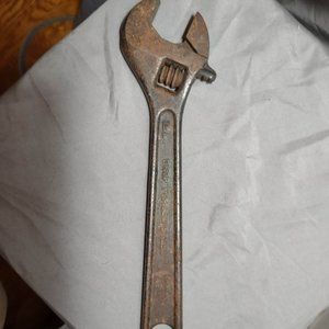 This is a Crescent Tool Company Forged Crestoloy Steel 12” Adjustable Wrench Jam